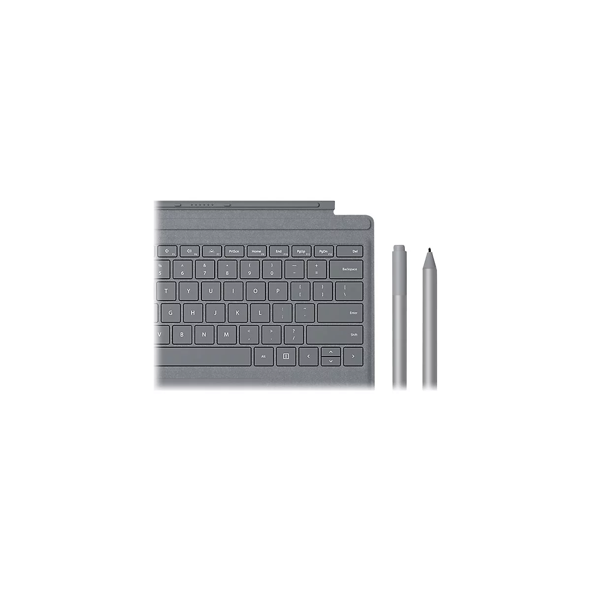 Clavier et stylet gris à côté d'une tablette. Accent sur les touches et la pointe du stylet.