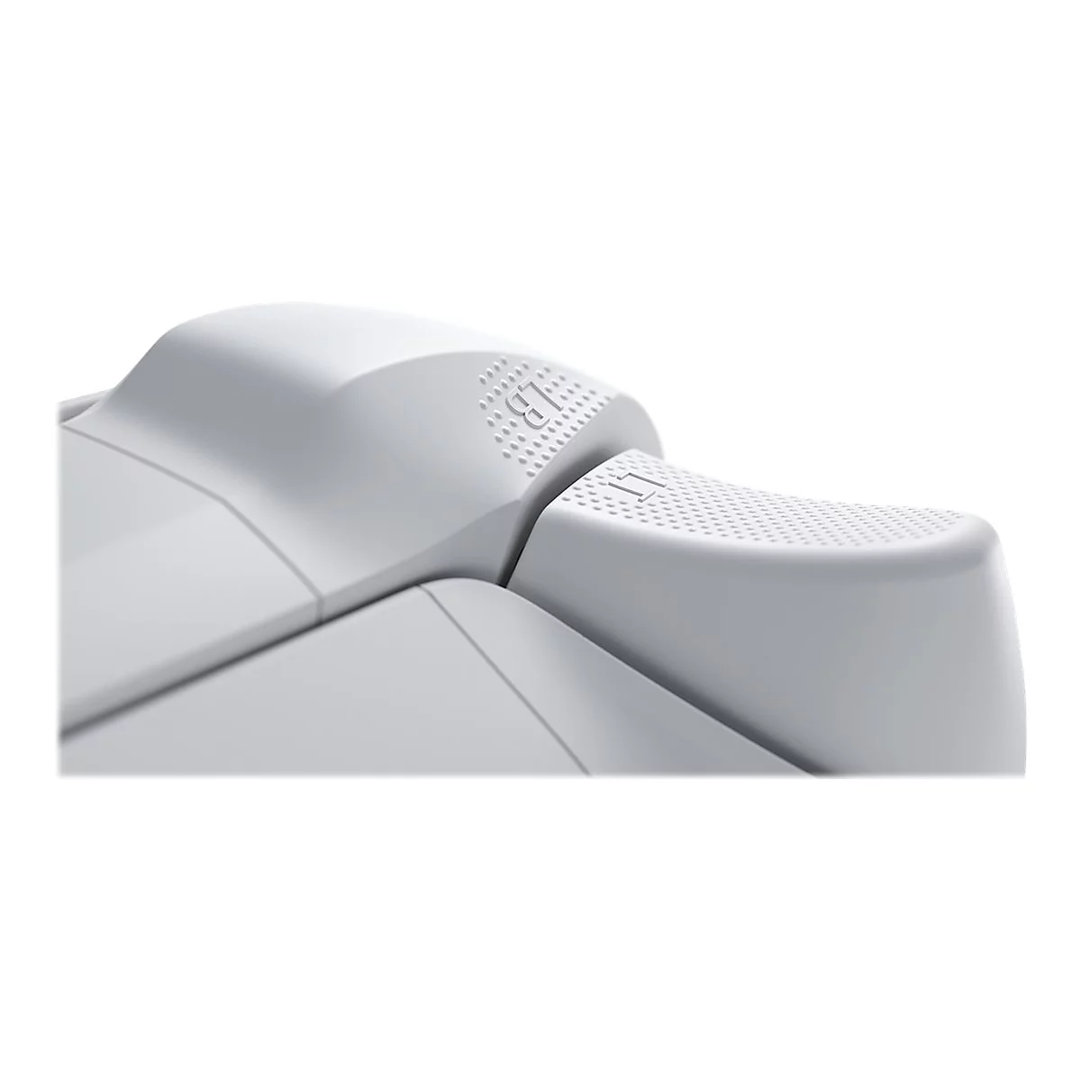 Gros plan sur une manette de jeu blanche. Le bouton LB avec une surface pointillée et le coin supérieur droit de la manette sont visibles.