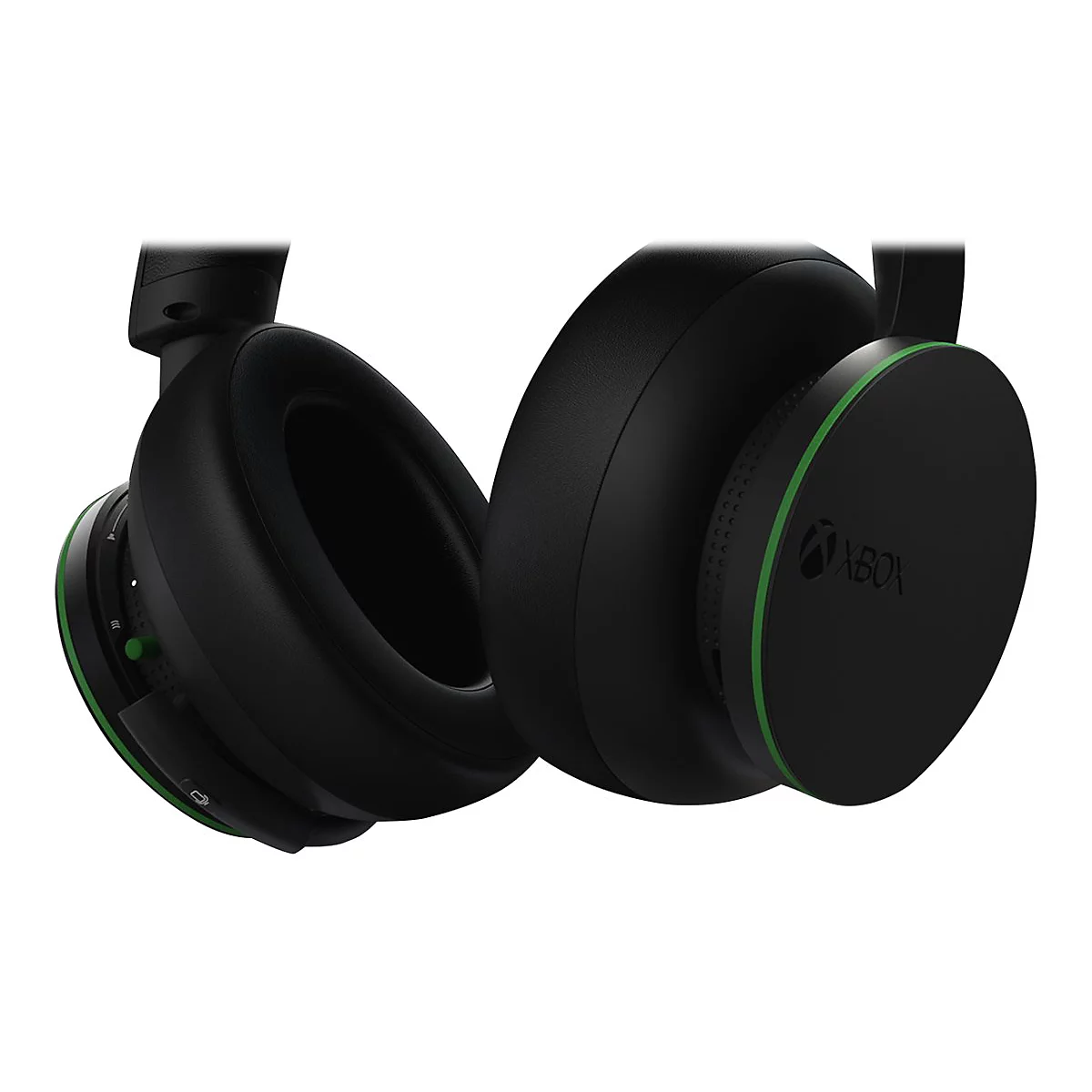 Gros plan d'un casque Xbox noir. Accents verts sur les oreillettes et le logo Xbox.