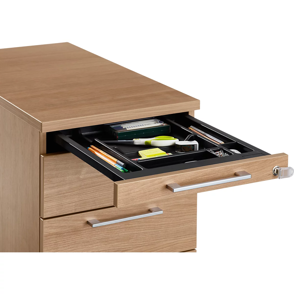 Wooden desk cabinet with open drawer filled with office supplies.