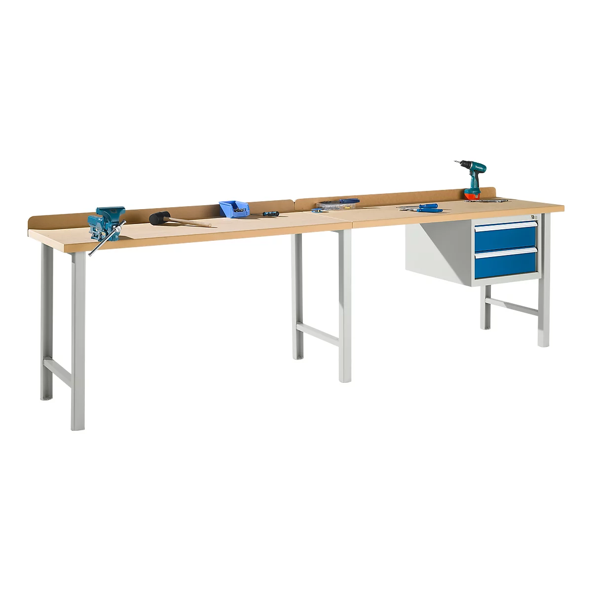 A light-colored workbench with silver legs, tools, and drawers. Drill, vise, hammer, wrench.