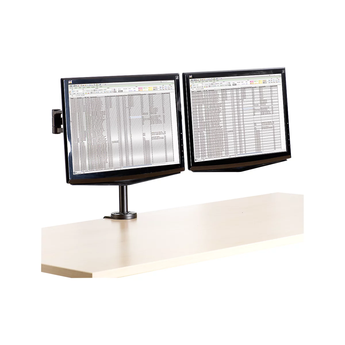 Two monitors on a table, displaying data in a spreadsheet. Black frames, black stand.
