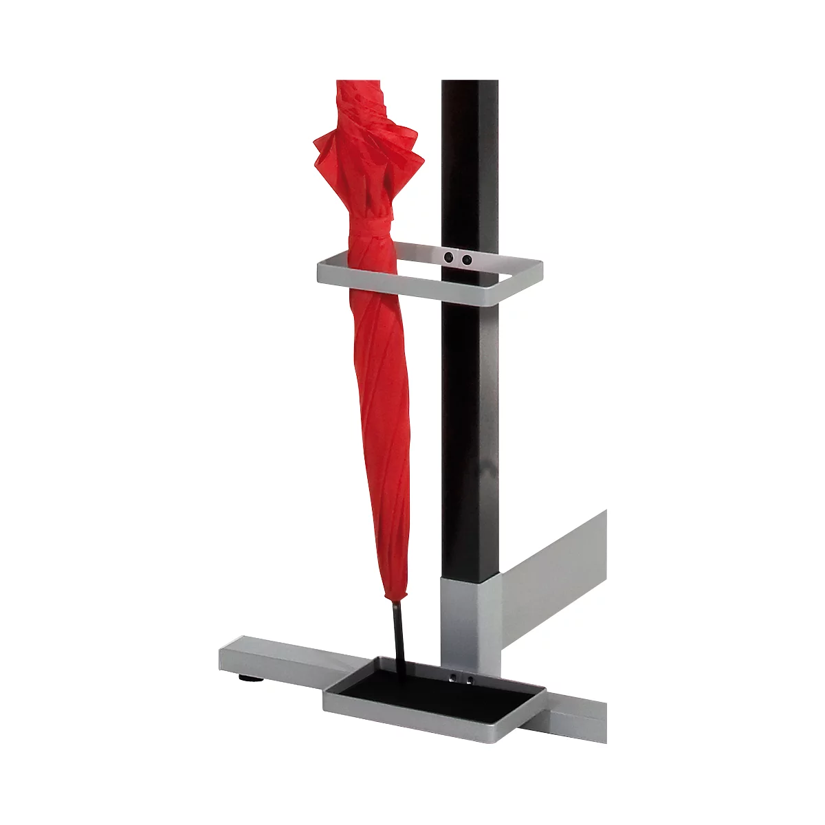 Red umbrella in a grey stand. The stand has a rectangular shape with a black post.