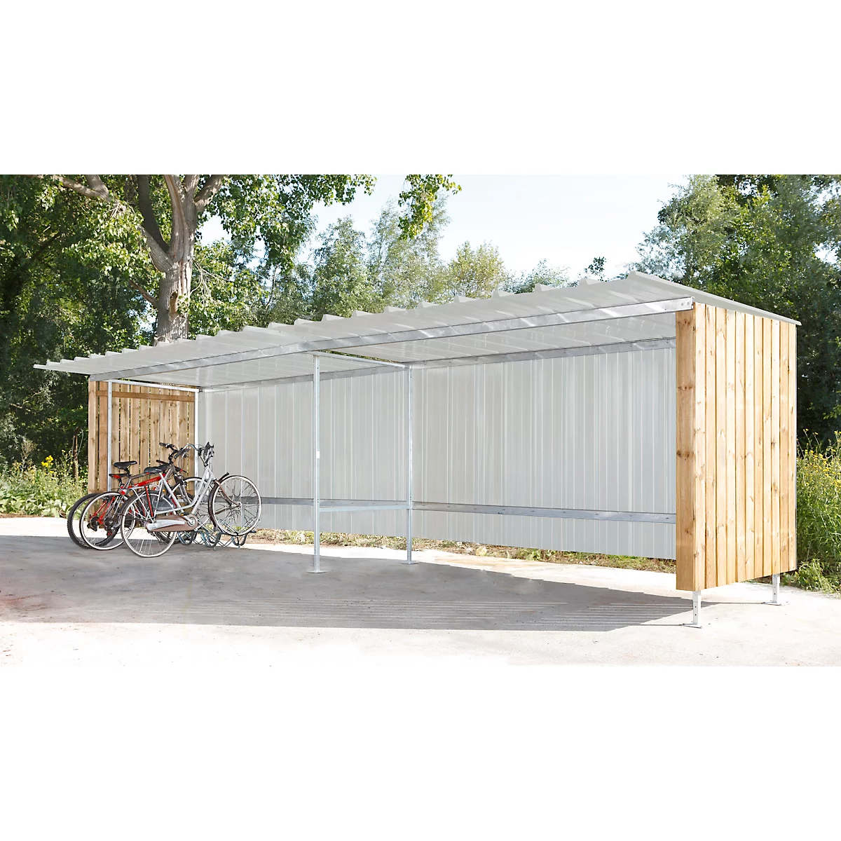 Bicycle shelter with bicycles, wood and corrugated iron roof, outdoors.
