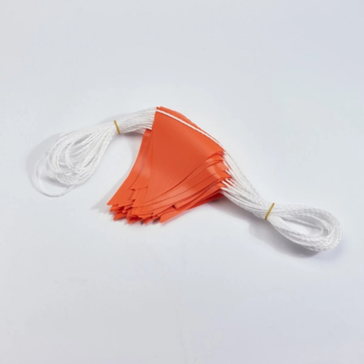 Orange pennant with white string on a white background.