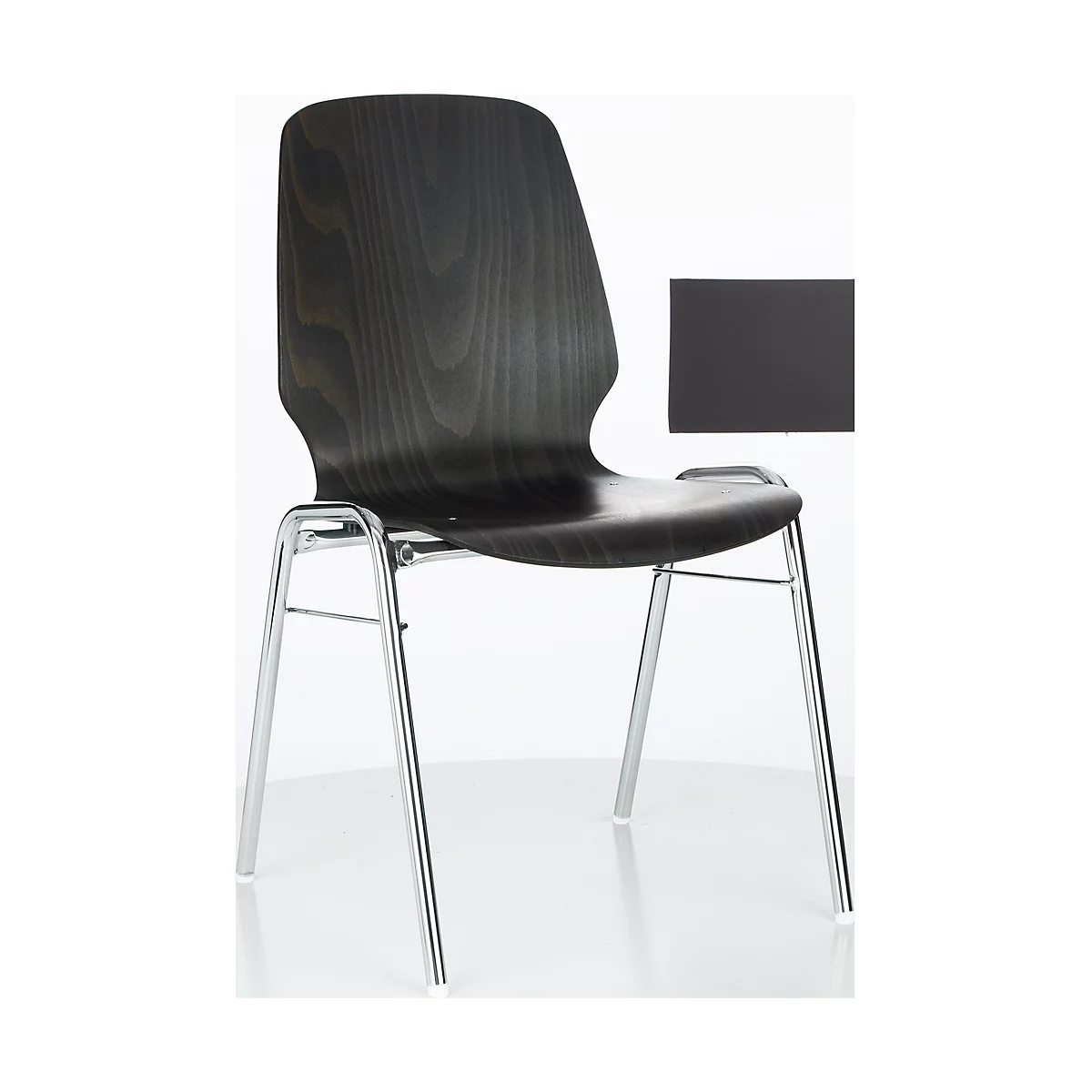 Black wooden chair with chrome legs on a white background. Next to it a black rectangle.