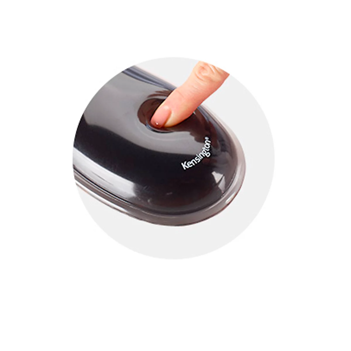 A finger pressing a button on a black Kensington device. The name Kensington is visible.