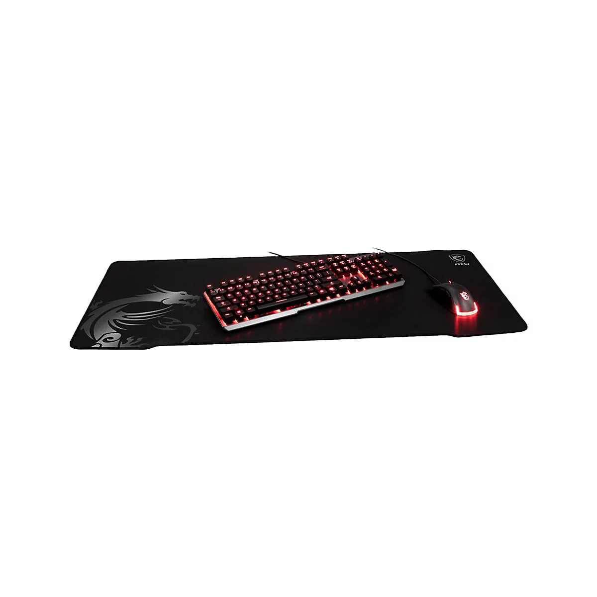 MSI Gaming Tastatur und Maus auf einem großen Mauspad mit Drachen-Logo vor weißem Hintergrund.