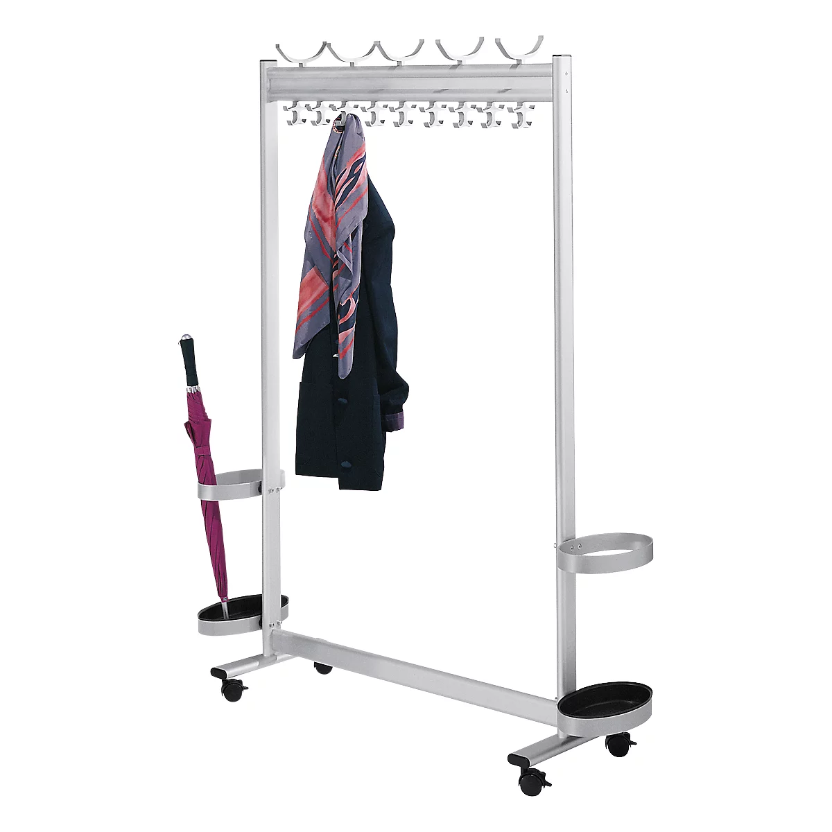 A silver coat rack with hooks, umbrella holders, and wheels. A scarf and a jacket hang on it. A red umbrella is in a holder.