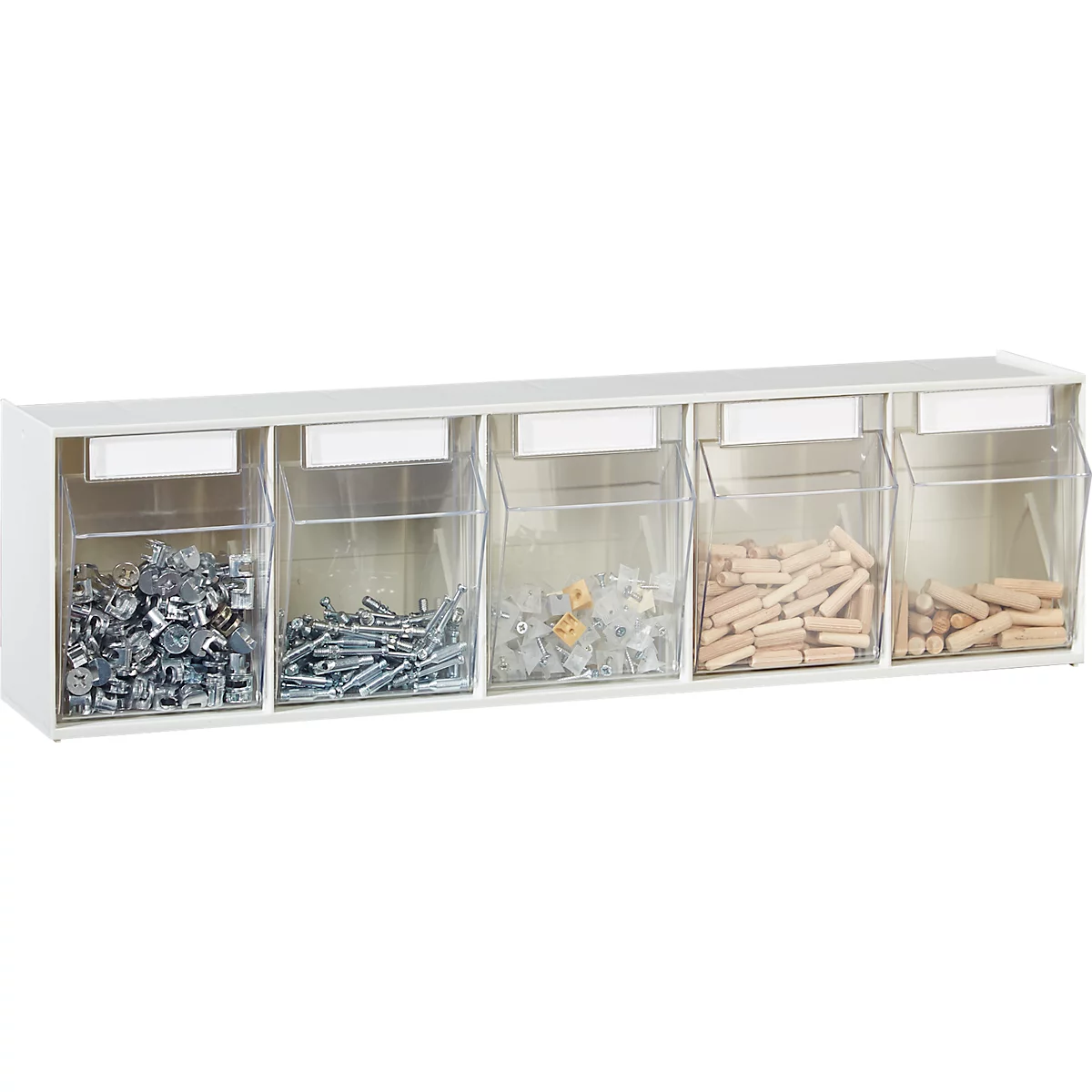 Witte plank met vijf transparante compartimenten. Elk compartiment bevat schroeven, pluggen en andere kleine onderdelen.