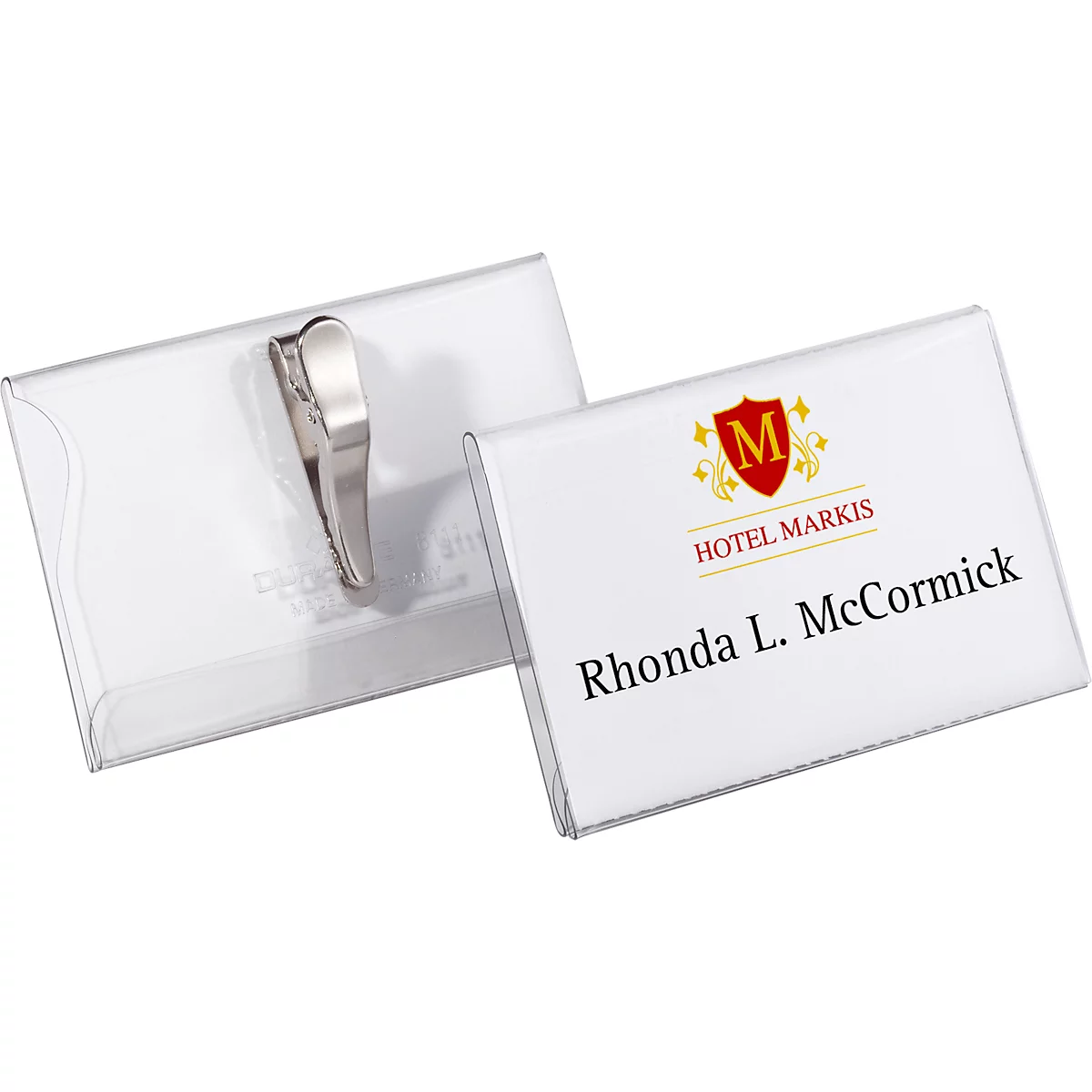White name tag with clip. Text: Hotel Markis, Rhonda L. McCormick.