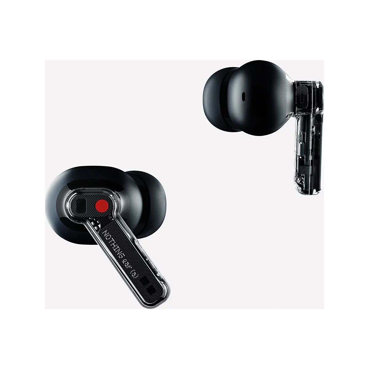 Zwei schwarze In-Ear-Kopfhörer mit transparentem Designgehäuse vor weißem Hintergrund.