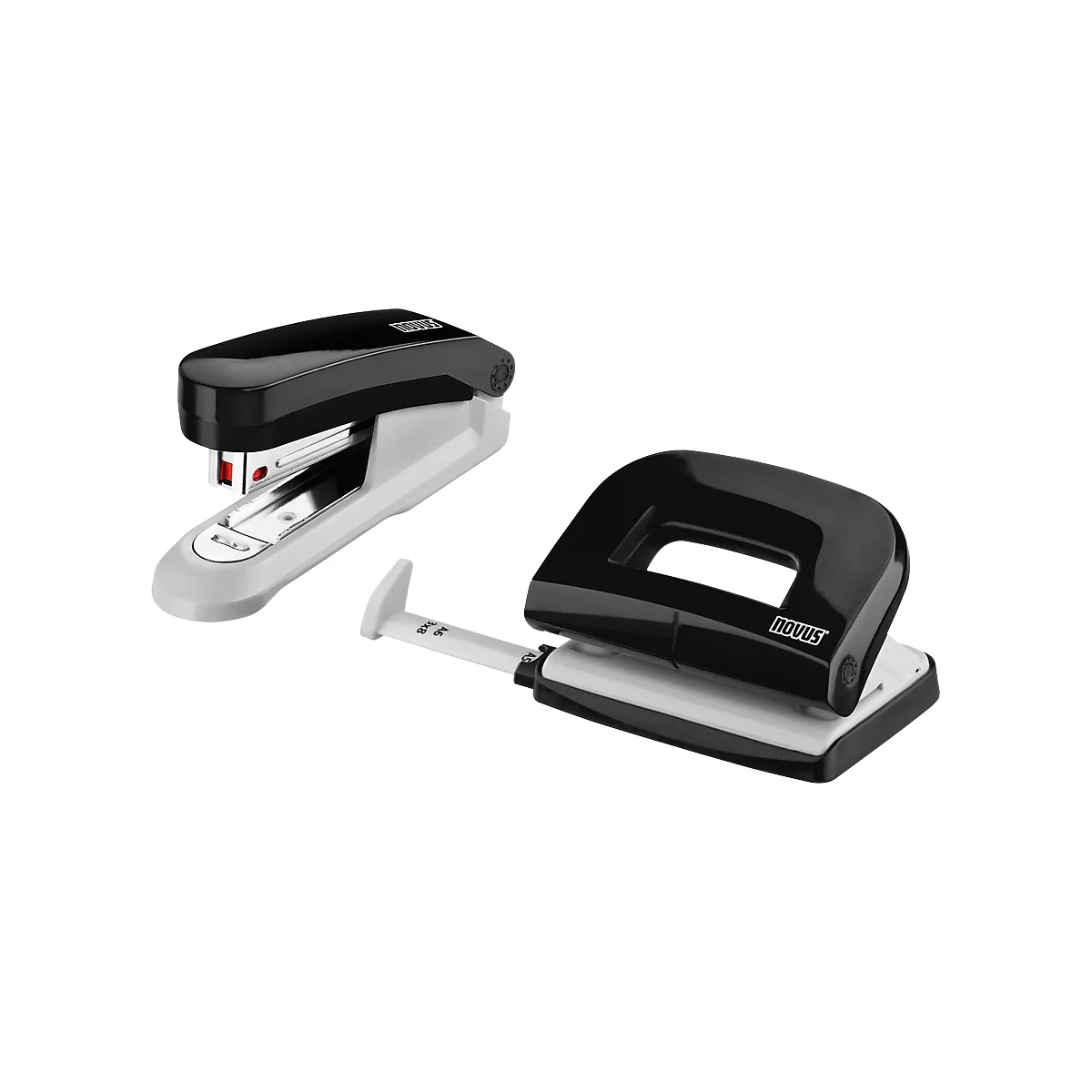 A black and white stapler and a black and white hole puncher lie side by side.