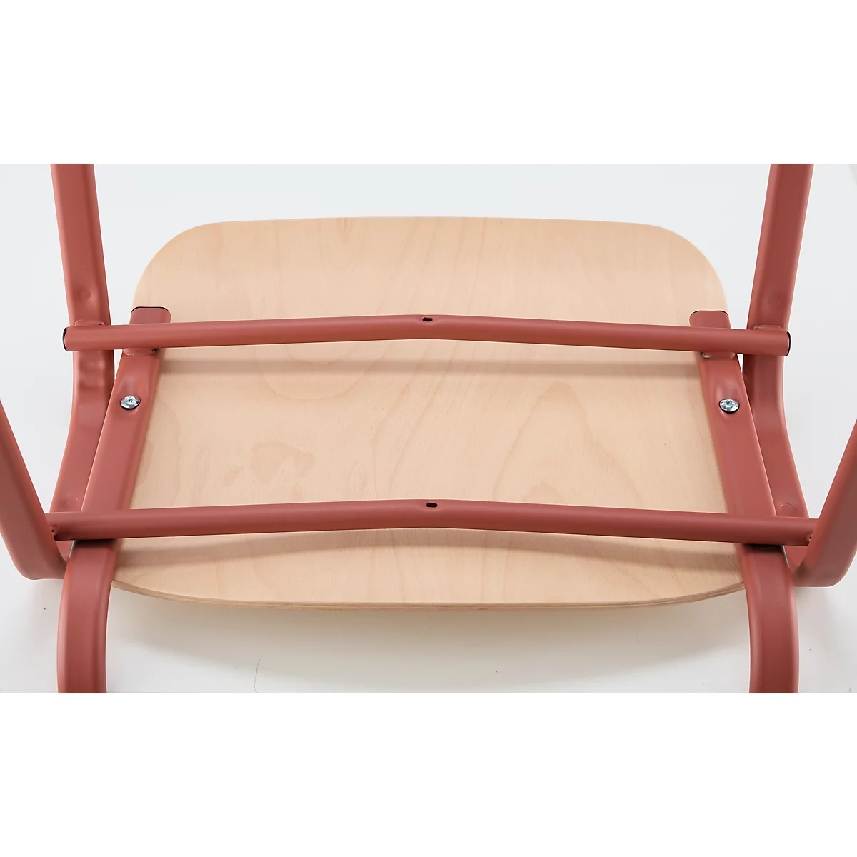 Top view of chair: wooden seat, reddish-brown frame made of metal tubes.