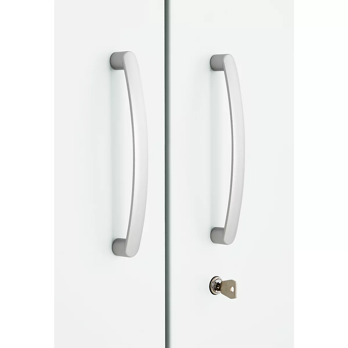 Two white cabinet doors with curved metal handles and a keyhole with a key.
