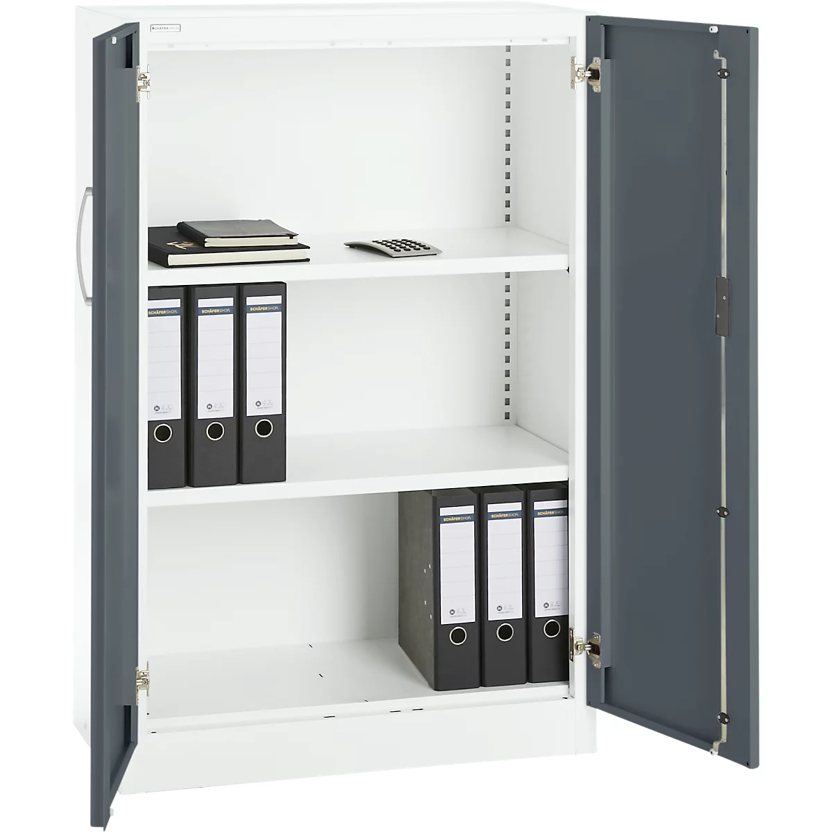 A white steel cabinet system, open, with gray doors. Inside, file folders, notebooks and a calculator can be seen.