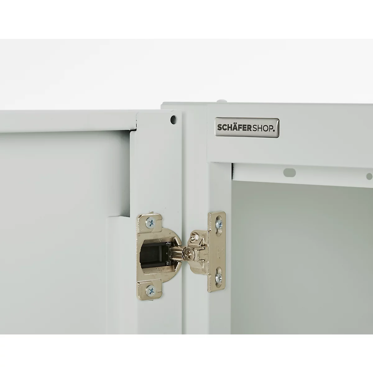 Cabinet door detail: White painted door with silver hinge and "SCHÄFERSHOP" logo.