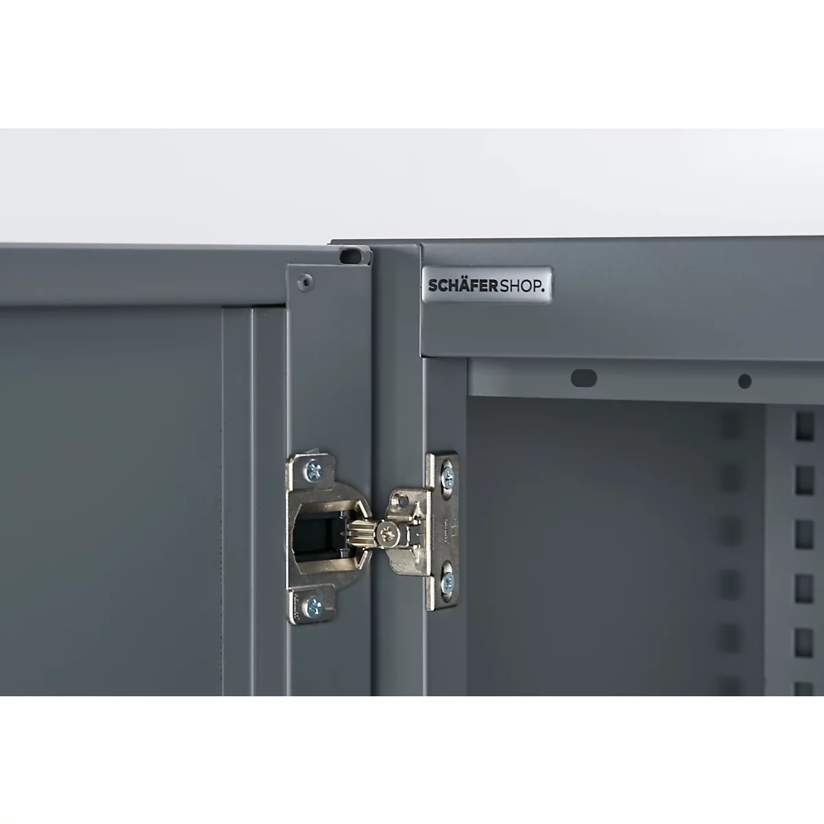 Gray cabinet, close-up of the hinge. With the logo 'SCHÄFERSHOP' at the top.