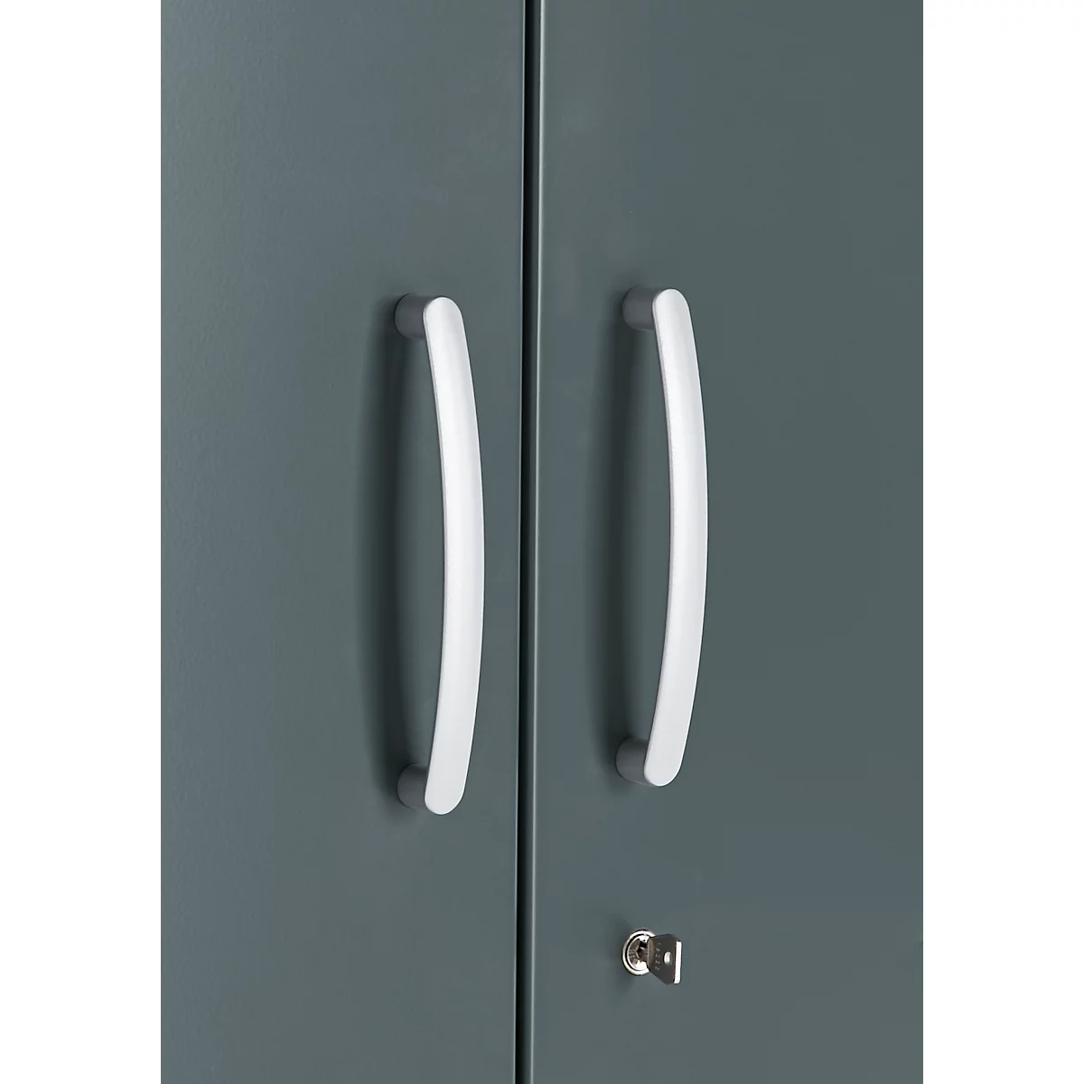 Two white, curved door handles on a gray cabinet door, with a keyhole below.