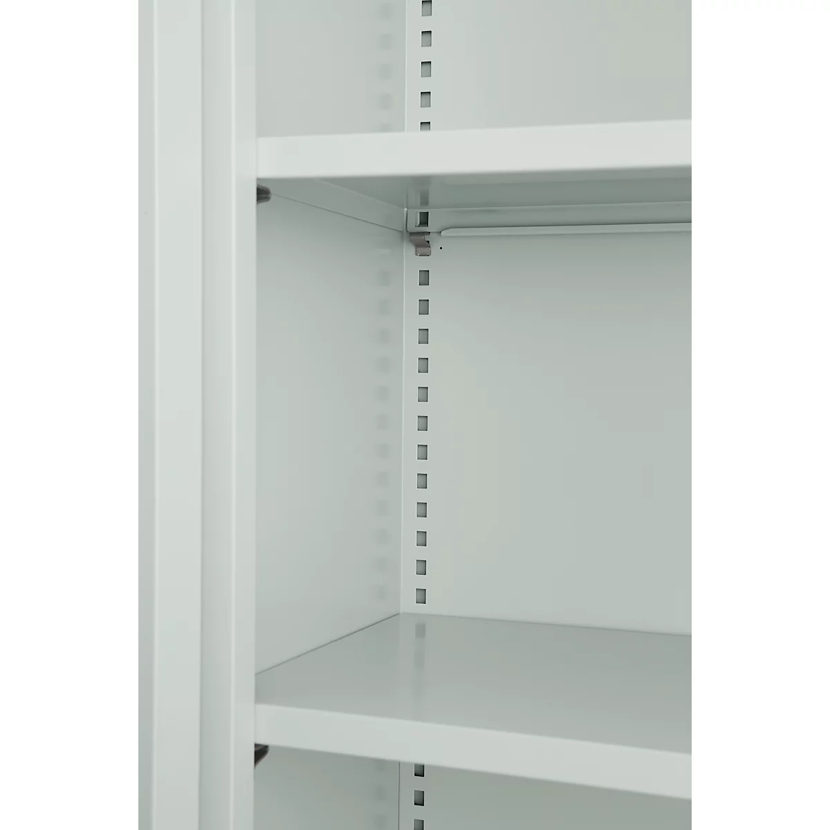 Close-up of a white cabinet with shelves. The cabinet is empty.
