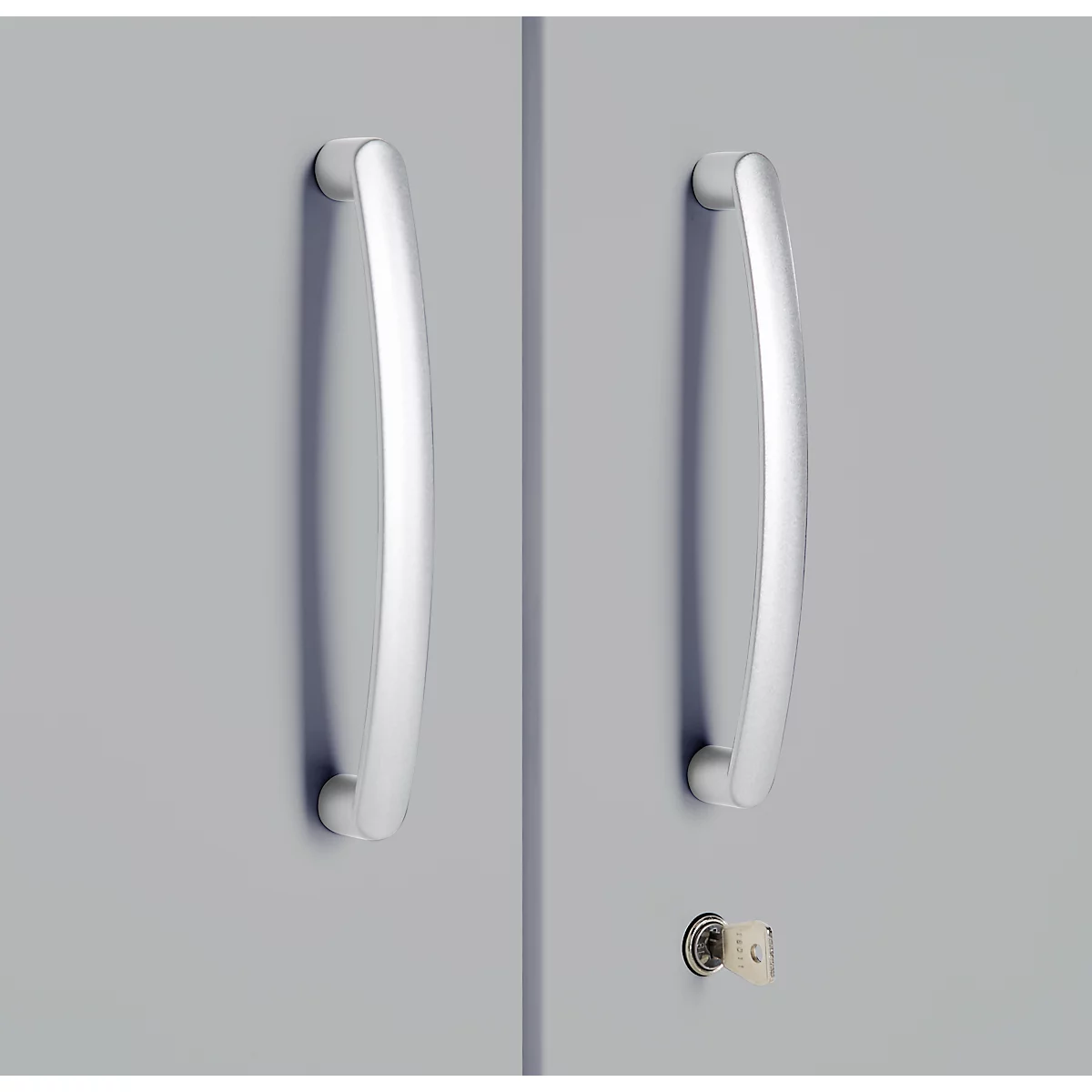 Grey cabinet doors with two silver handles and a keyhole.