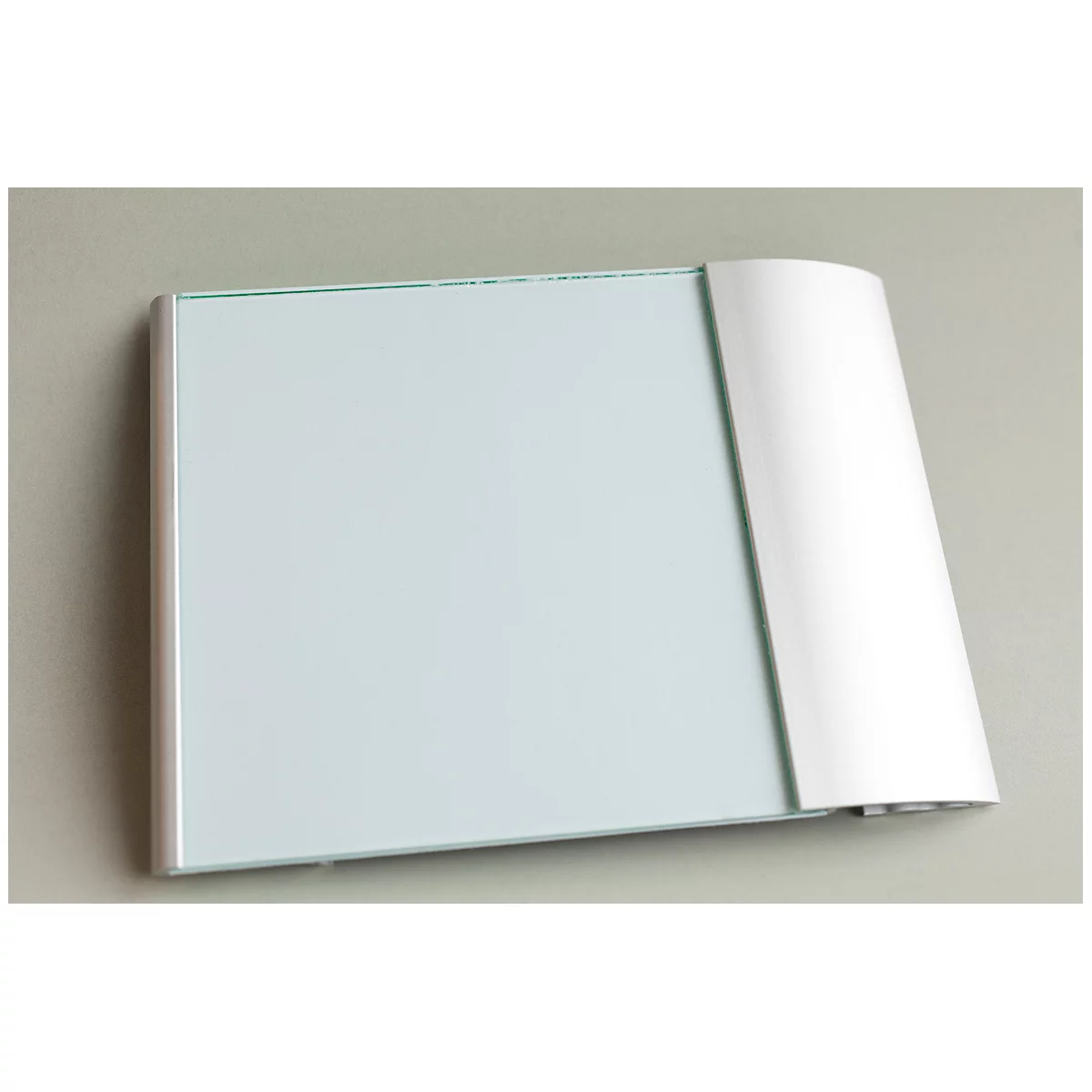 Rectangular white whiteboard with rounded white side.