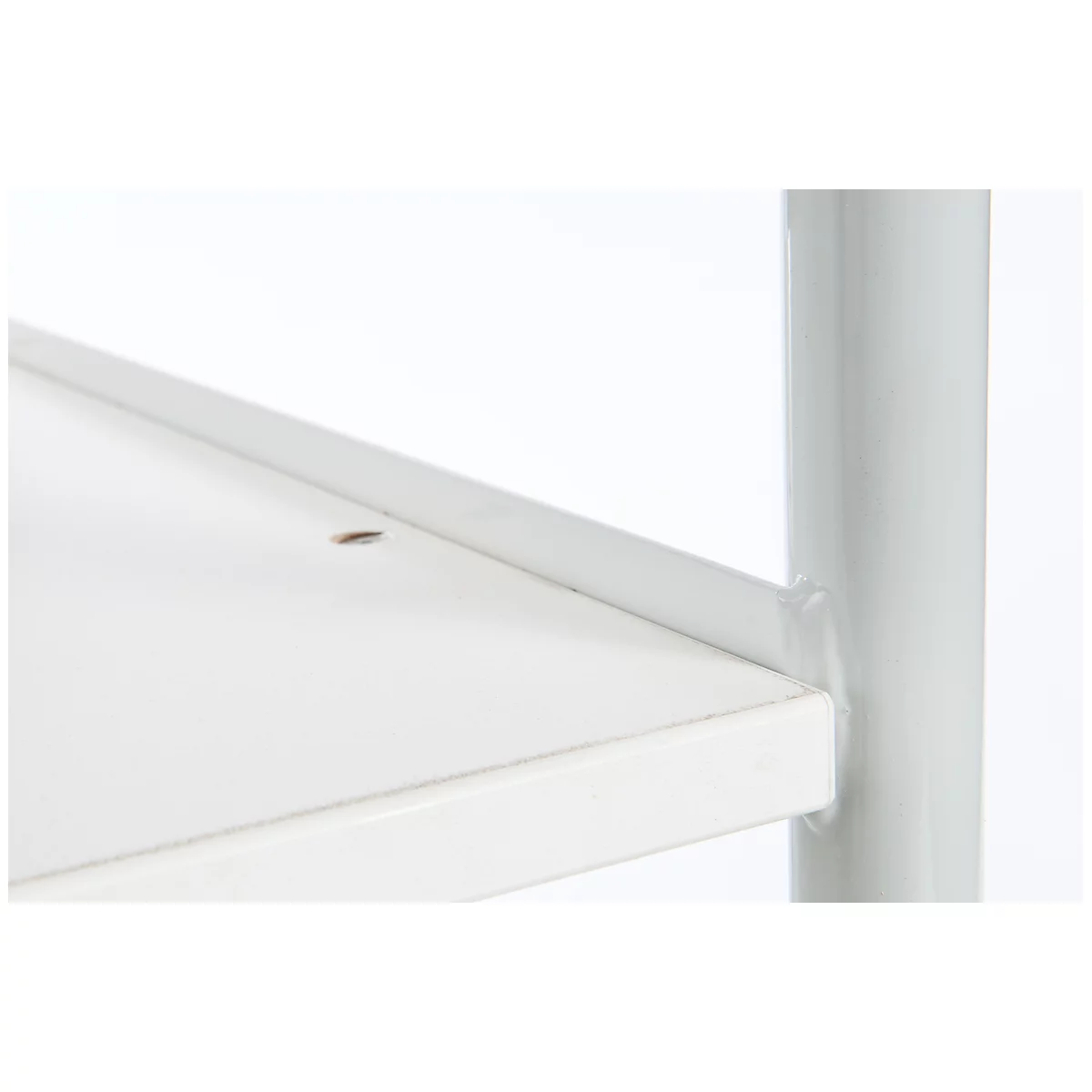 Close-up of a white shelf with a metal edge. Next to it a gray, cylindrical support.