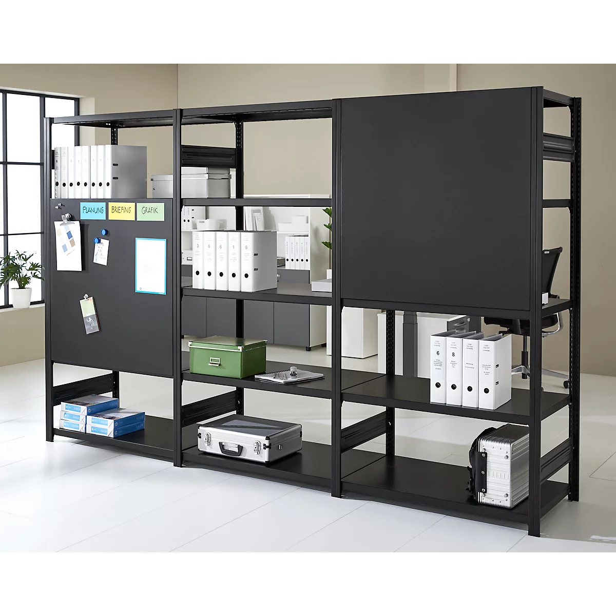 Black shelving unit with files, documents and notes. Office environment.