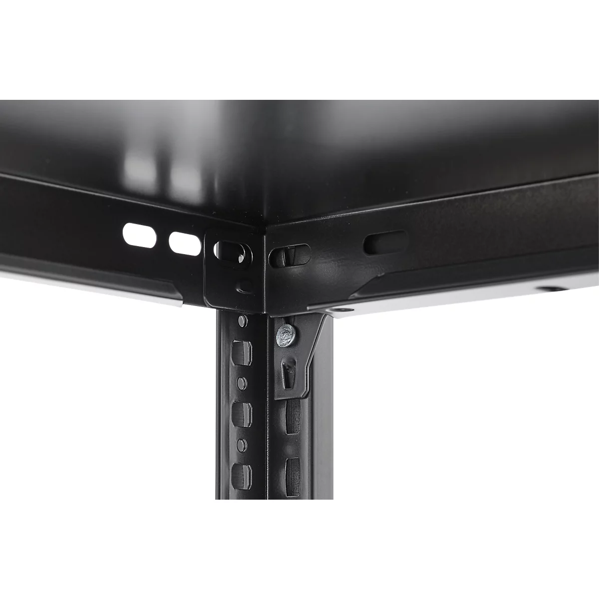 Close-up of a black metal shelf construction. Angles and connections are clearly visible.