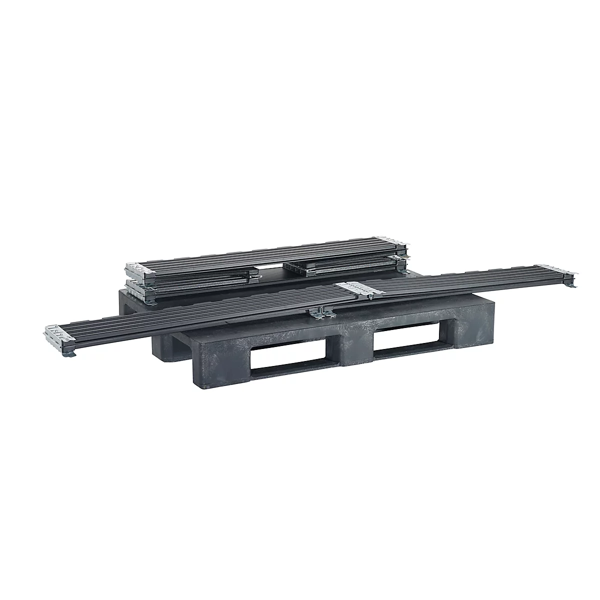 Black conveyor belts on a black pallet, against a white background.