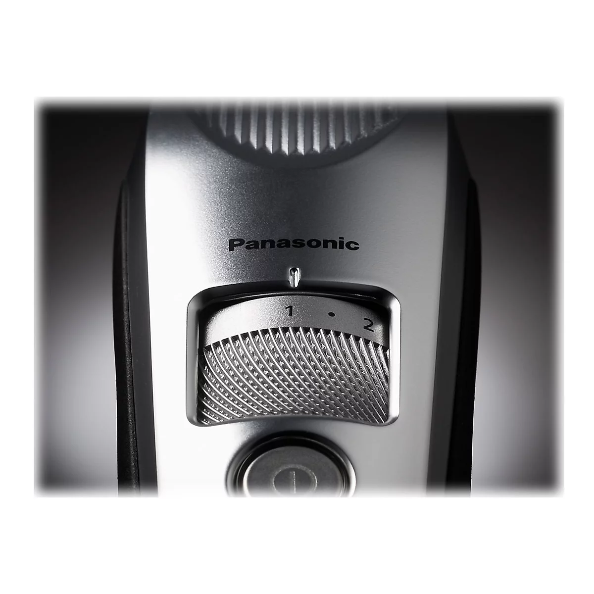 Detailaufnahme eines Panasonic-Trimmers, Fokus auf dem Einstellrad mit den Ziffern 1 und 2.