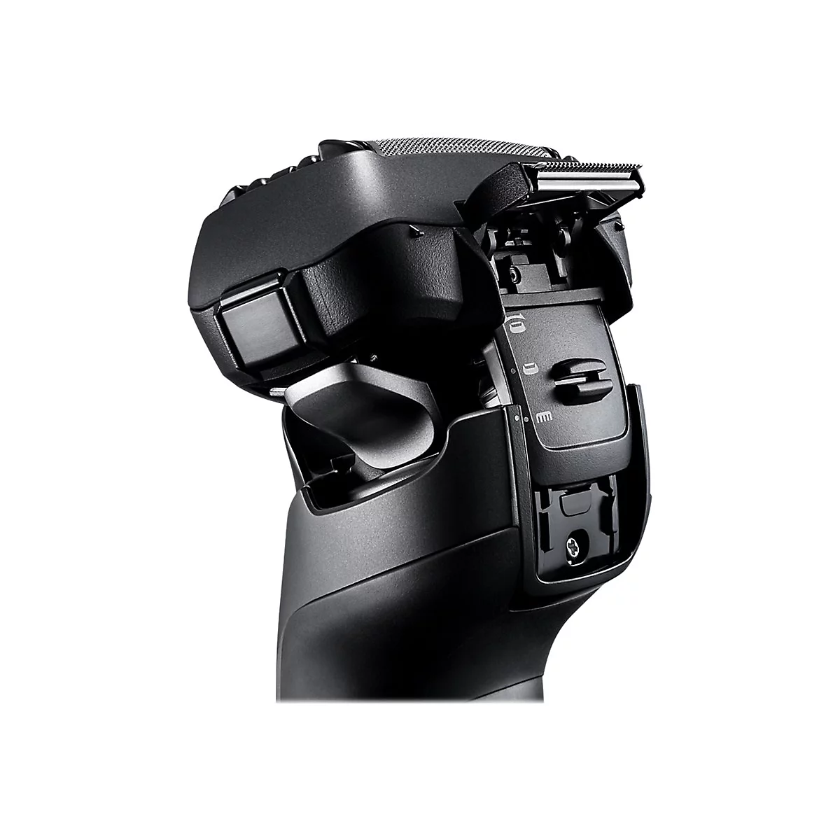 Gros plan d'un rasoir électrique noir avec une tête de rasage ouverte, montrant les lames et les détails du mécanisme.