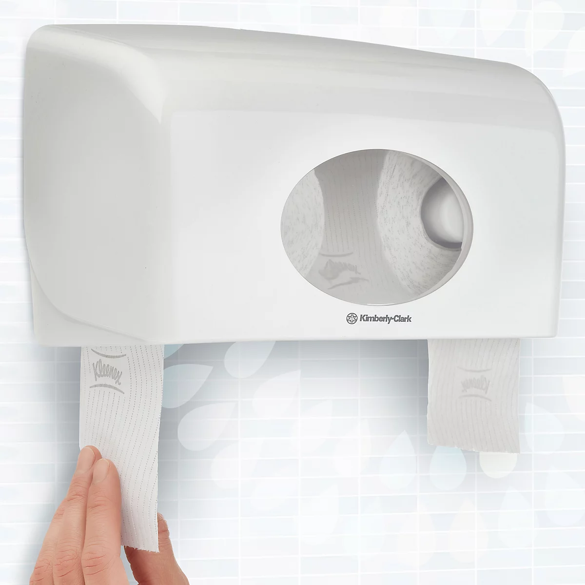Dispensador de toallas de papel blanco. Un brazo saca una toalla. Con el logotipo de Kimberly-Clark.