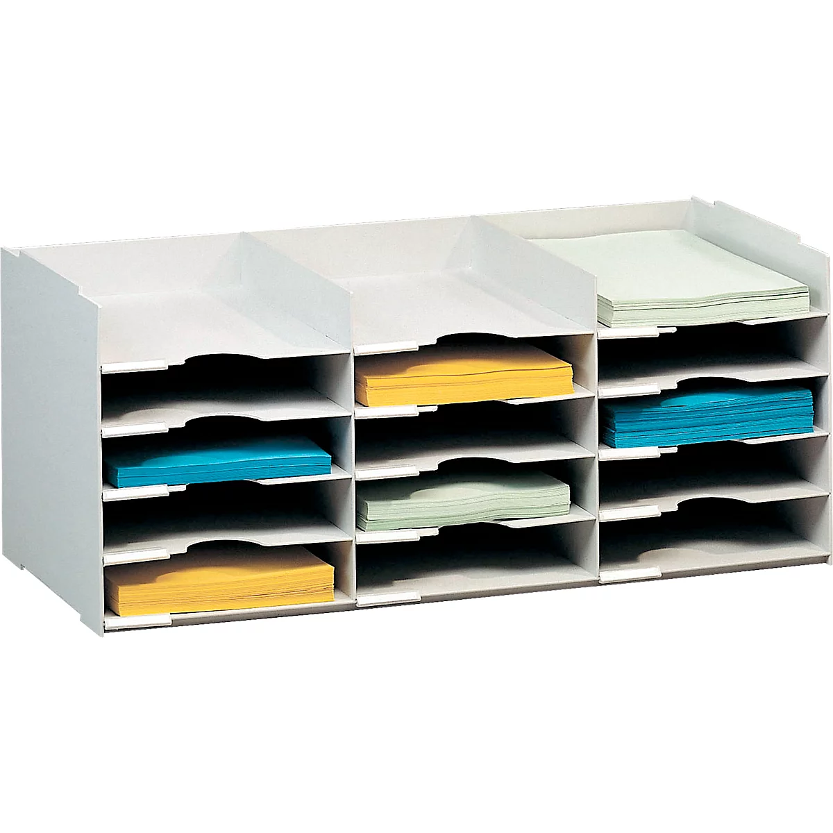 White file organizer with multiple compartments filled with colored paper. Organized office essential.