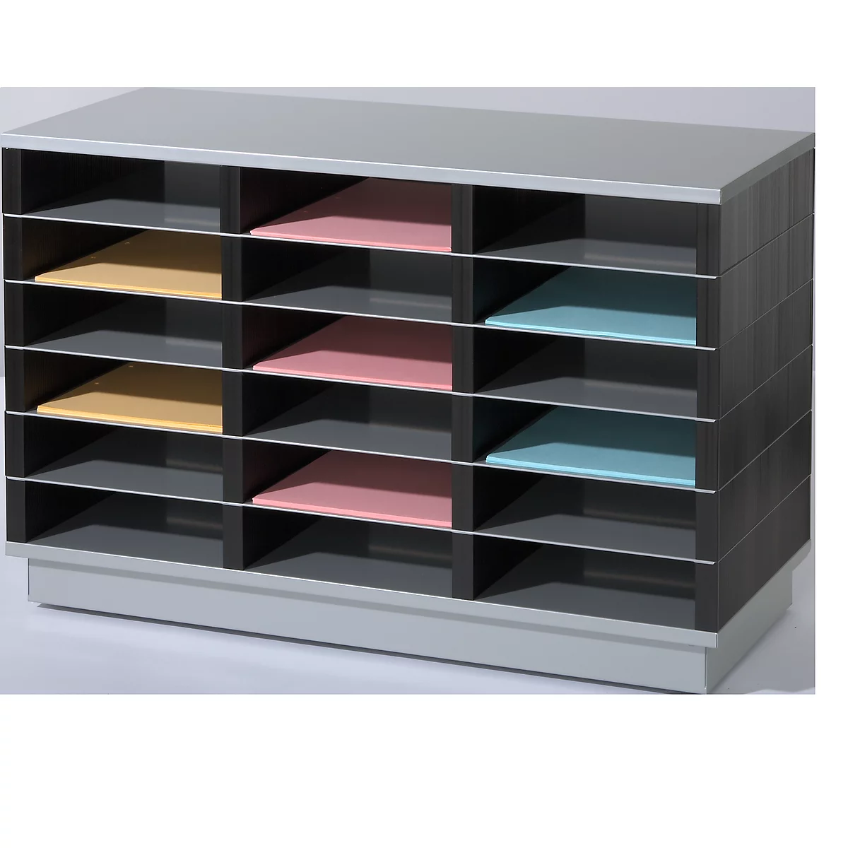 A gray and black filing system with open compartments containing colored sheets.