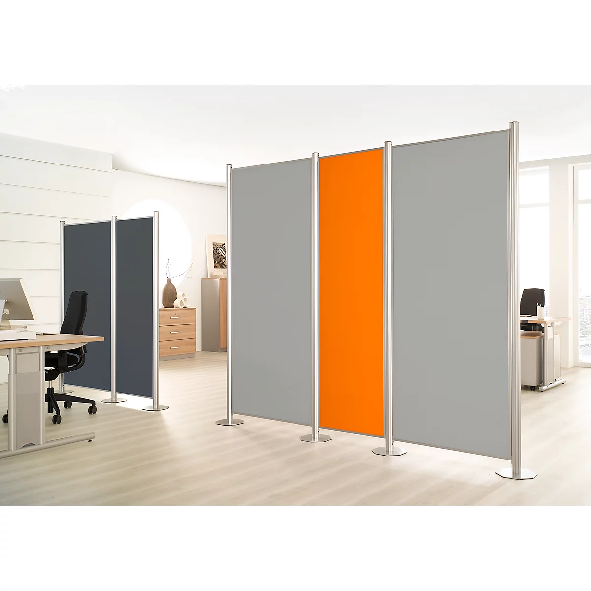 Gray and orange office partitions, aluminium frames, in a bright office.