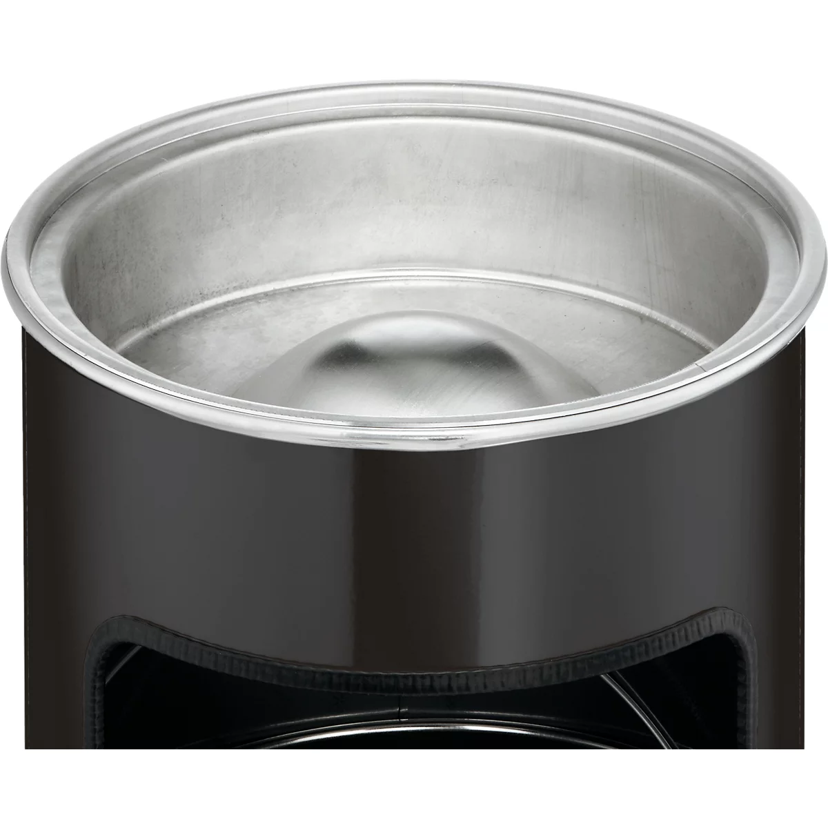 Close-up of a black container with a silver interior and rim.