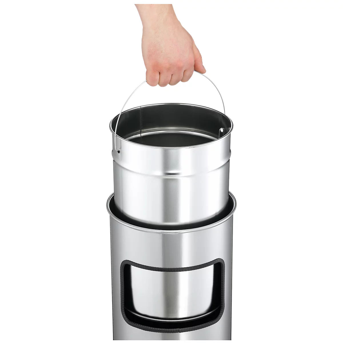 Hand lifting a metallic inner bucket from a trash can. The bucket has a carrying handle.