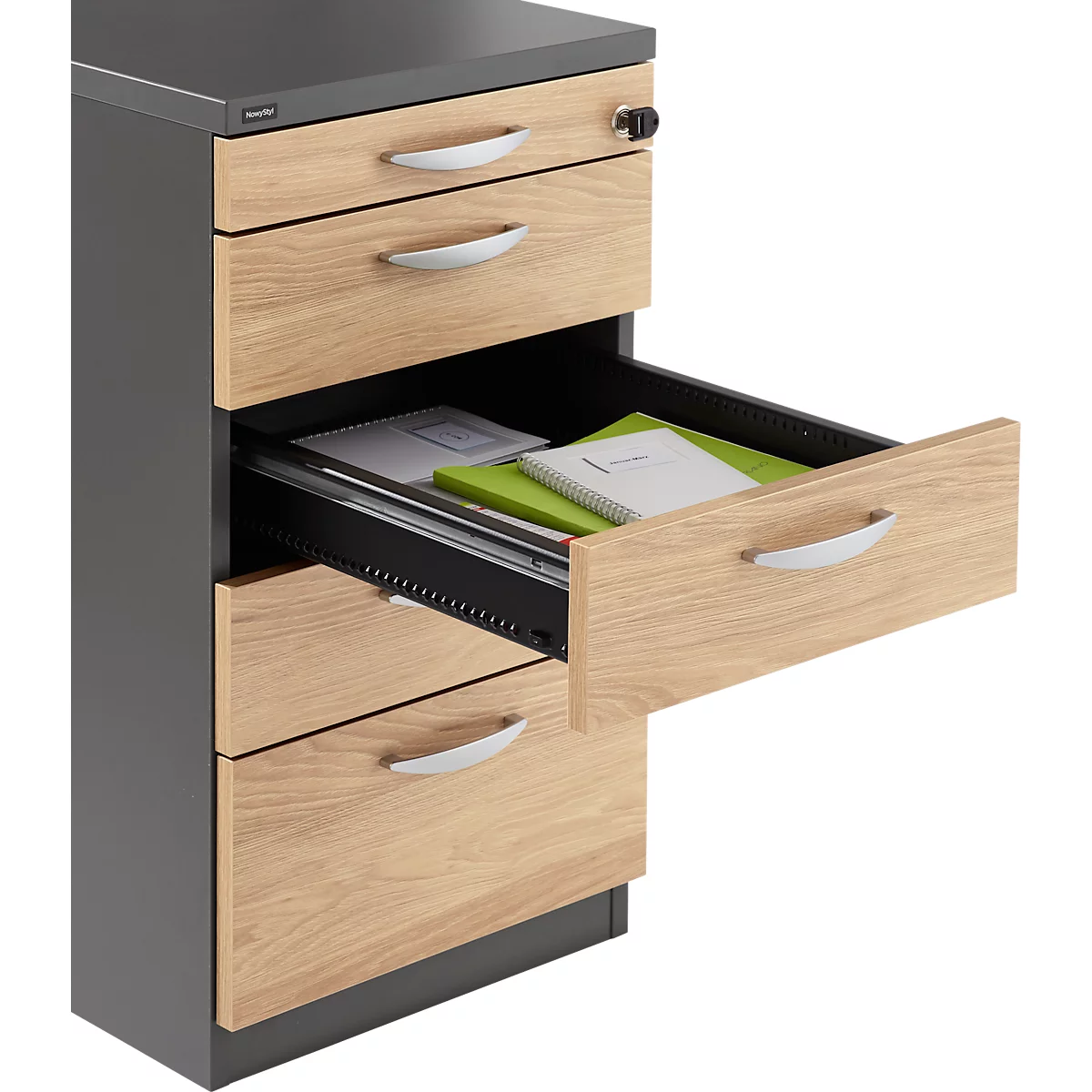 Chest of drawers with open drawer holding documents. Wood look with silver handles, black frame.