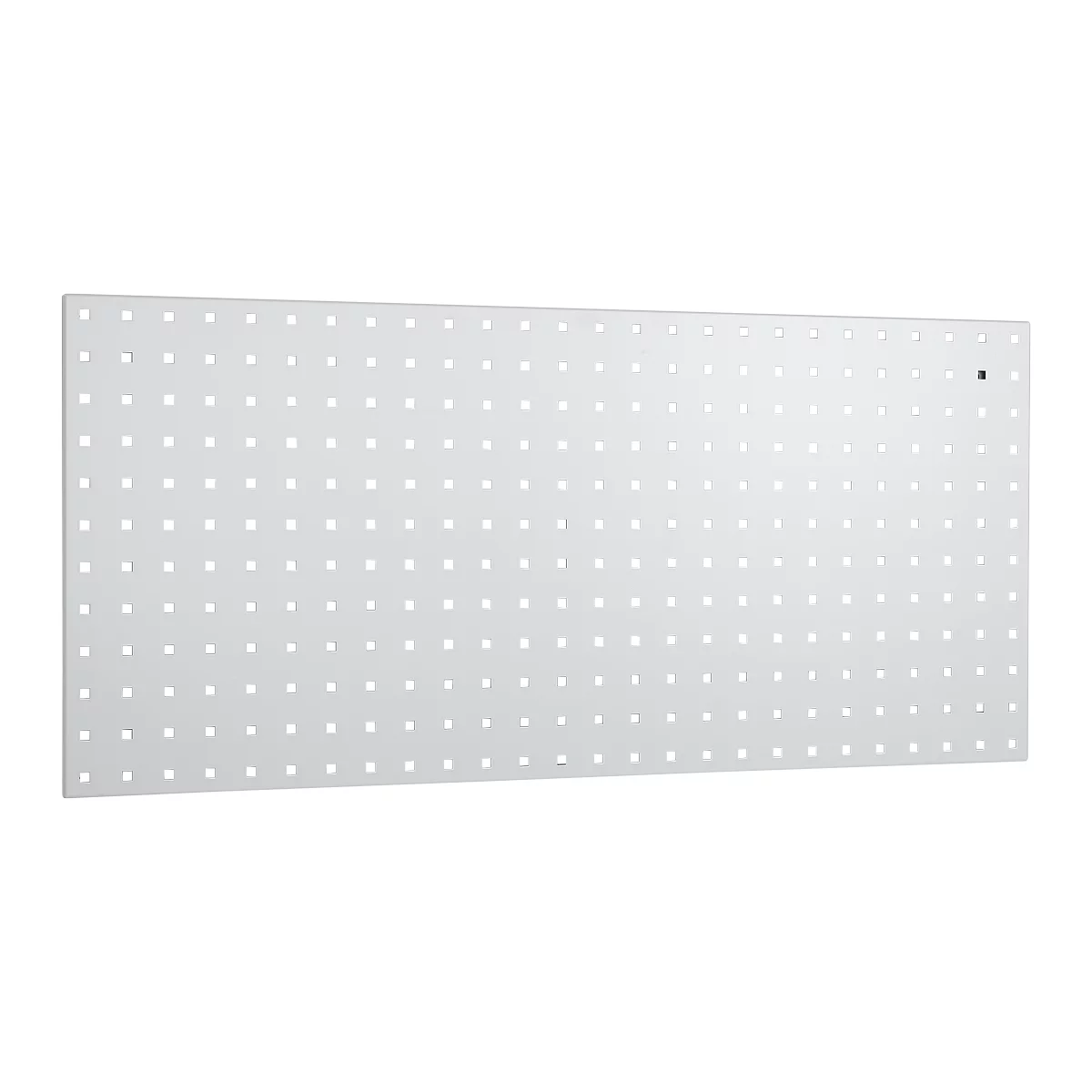 White pegboard with many small holes. A black magnet is visible.