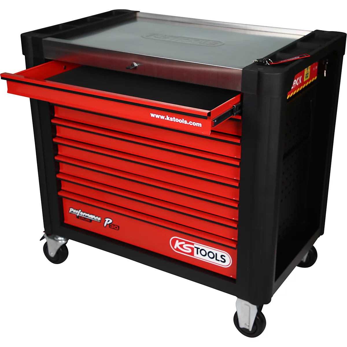 Roter Werkzeugwagen mit teilweise geöffneter Schublade. Schwarze Elemente und Rollen. Aufschrift: KS TOOLS.