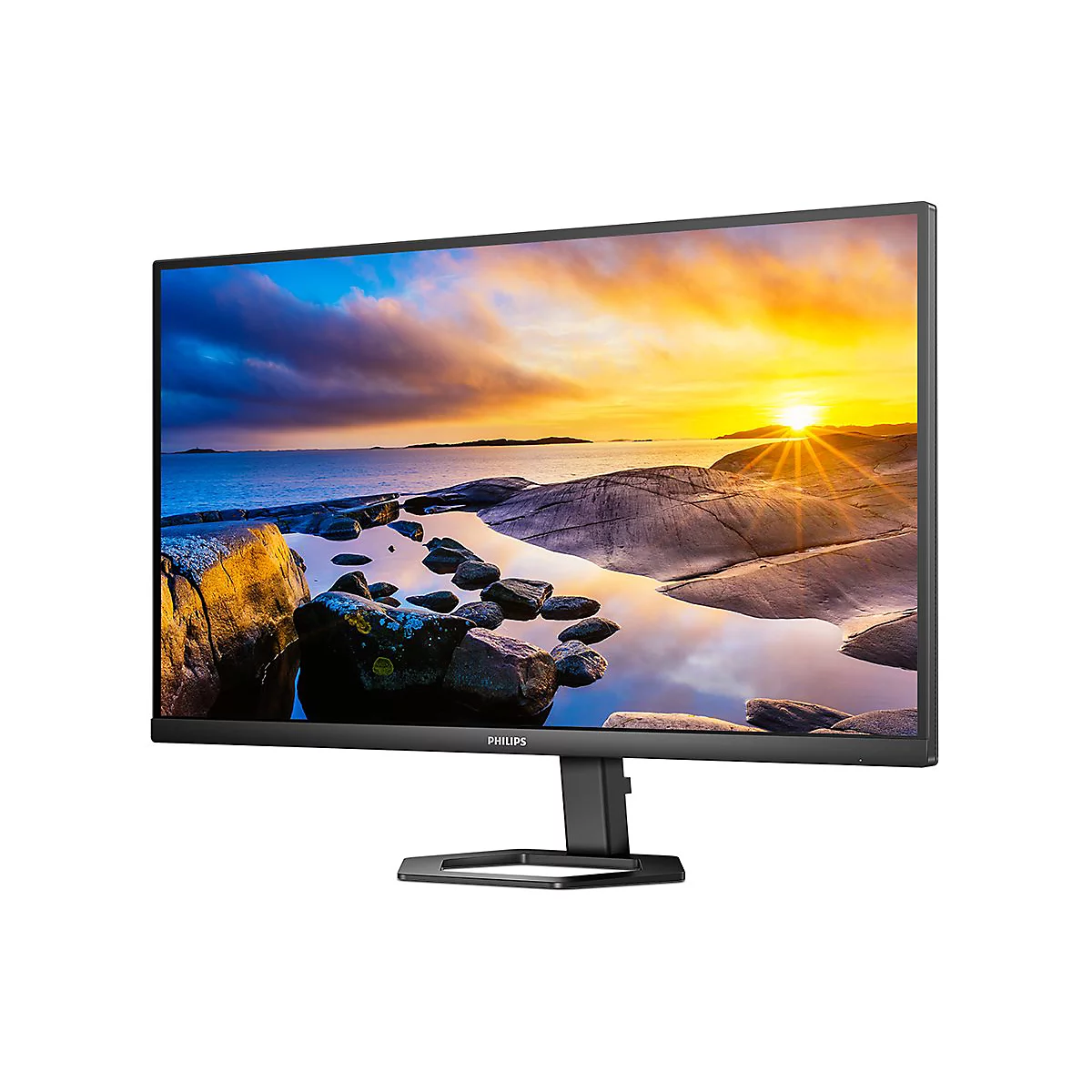 Ein schwarzer Philips-Monitor, der ein Landschaftsbild mit Sonnenuntergang zeigt. Das Display hat einen schwarzen Rahmen, einen Ständer und das Philips-Logo.