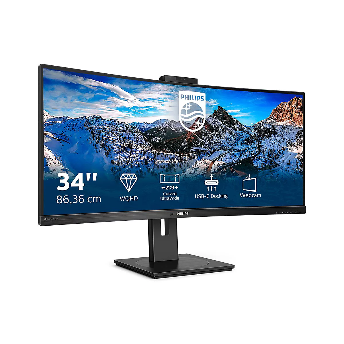 Ein schwarzer Philips Monitor mit 34 Zoll, der vor weißem Hintergrund steht und ein Bergpanorama zeigt.