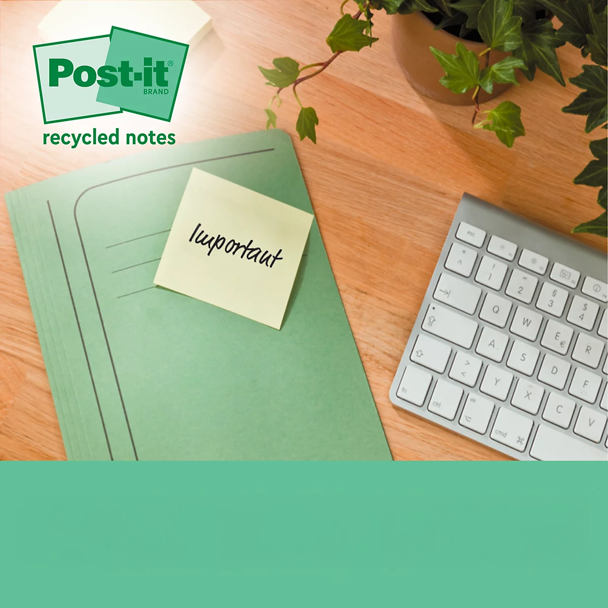 Gele Post-it briefje met het woord 'important' op een groene map, naast een toetsenbord en plant.