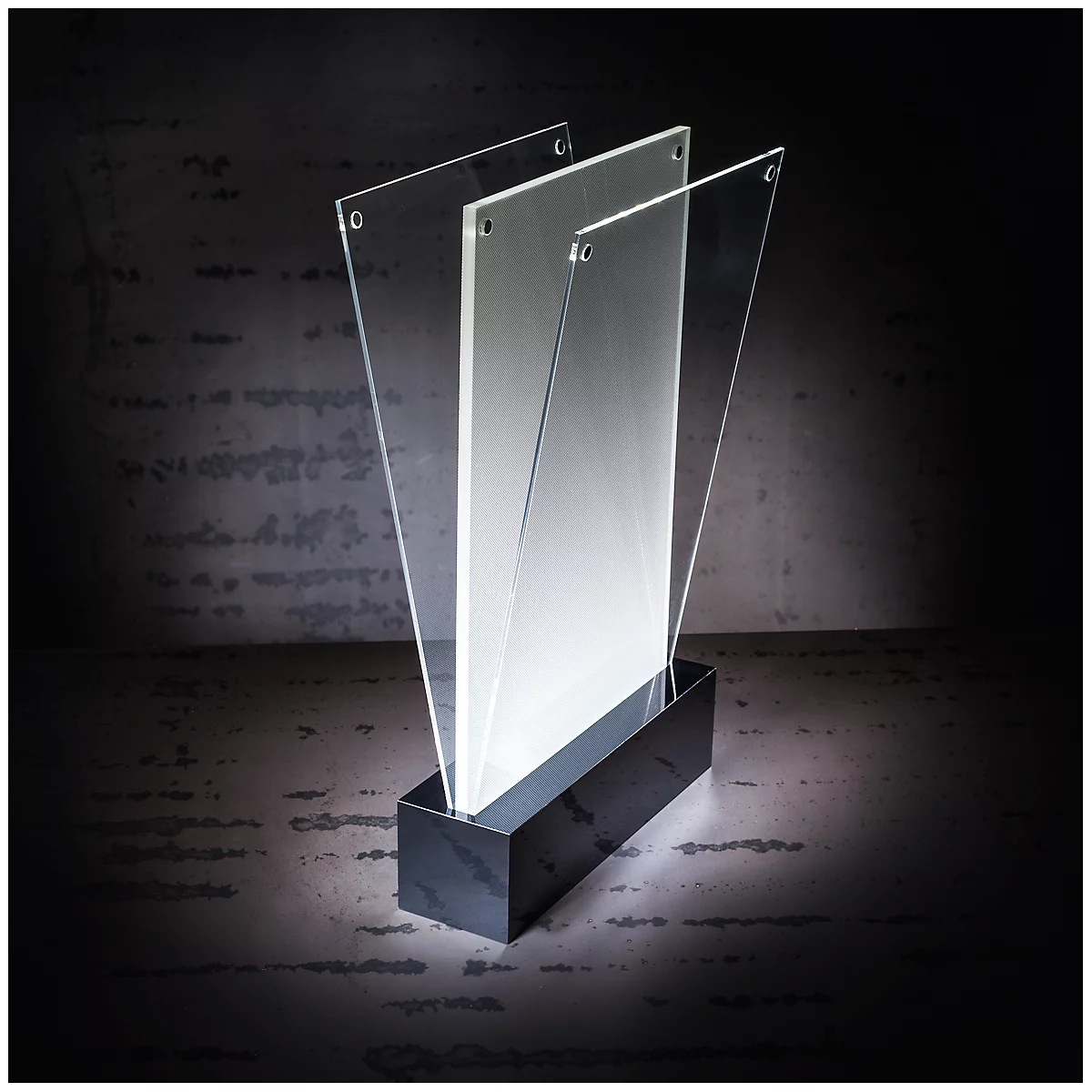 Sculpture with transparent elements and dark base. Looks modern and minimalist.