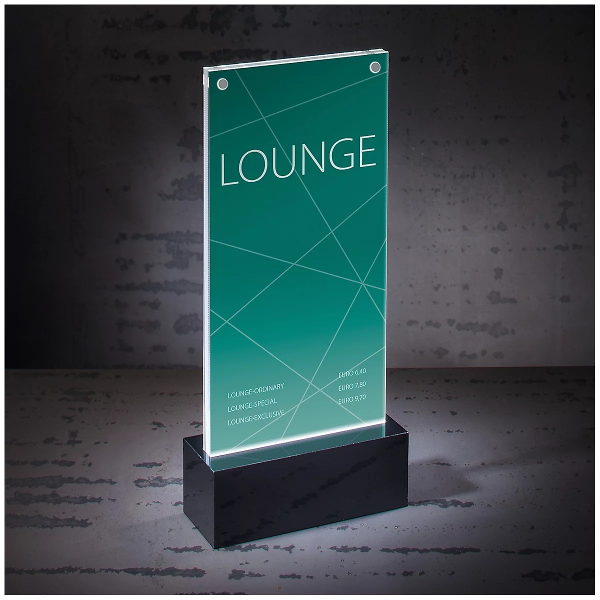 Illuminated lounge sign with text and green background, standing on a black base.