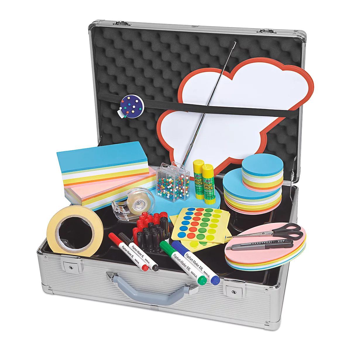 Opened silver suitcase with various presentation items: paper, pens, glue, scissors.