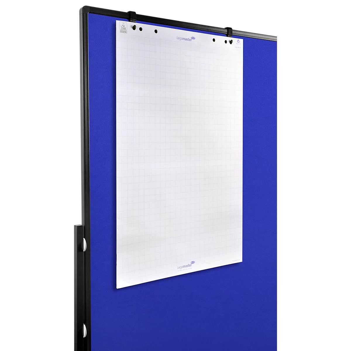 White grid flipchart paper hangs on a blue board with a black frame.