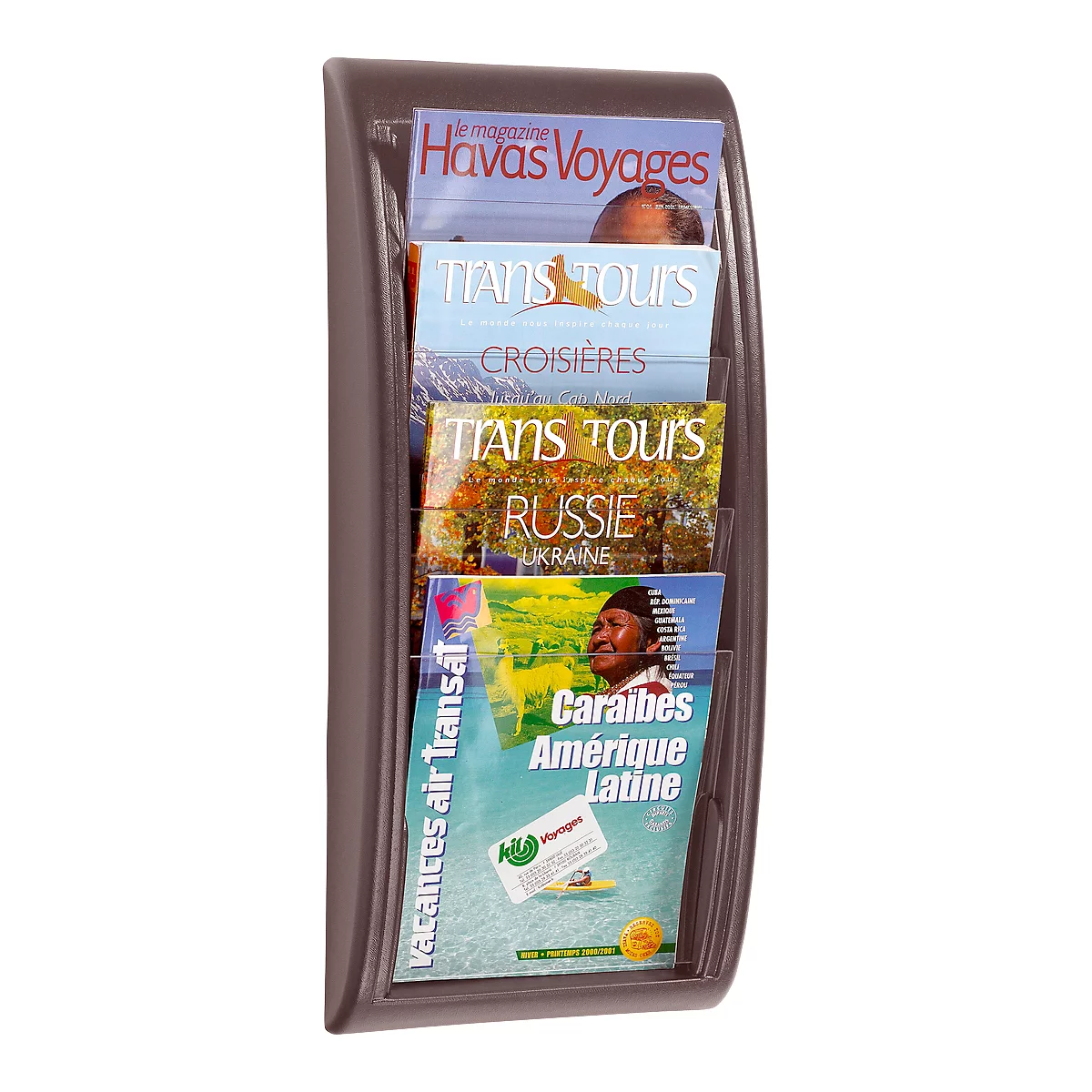 Brown magazine holder with travel magazines. Titles: Havas Voyages, Trans Tours, Russie, and Caribbean.