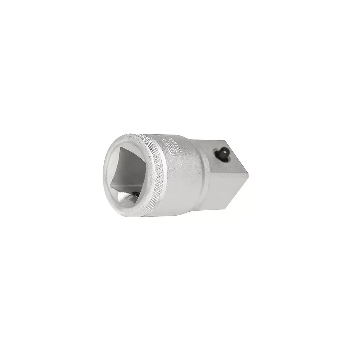 Adaptateur en métal argenté avec ouvertures carrées et hexagonales. Il y a une texture moletée sur le côté et un bouton noir.